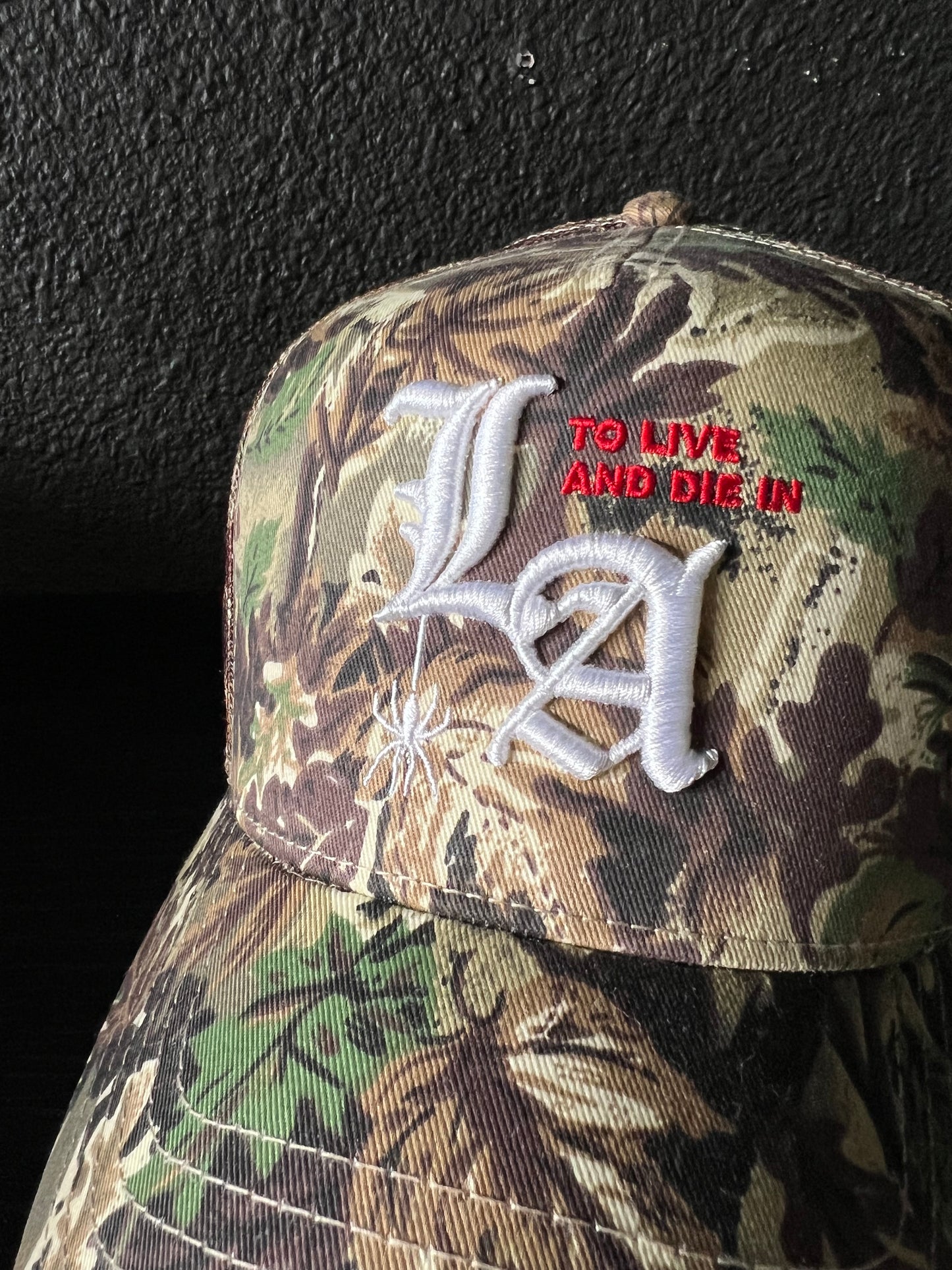 "To Live and Die in LA" Trucker Hat in Camo