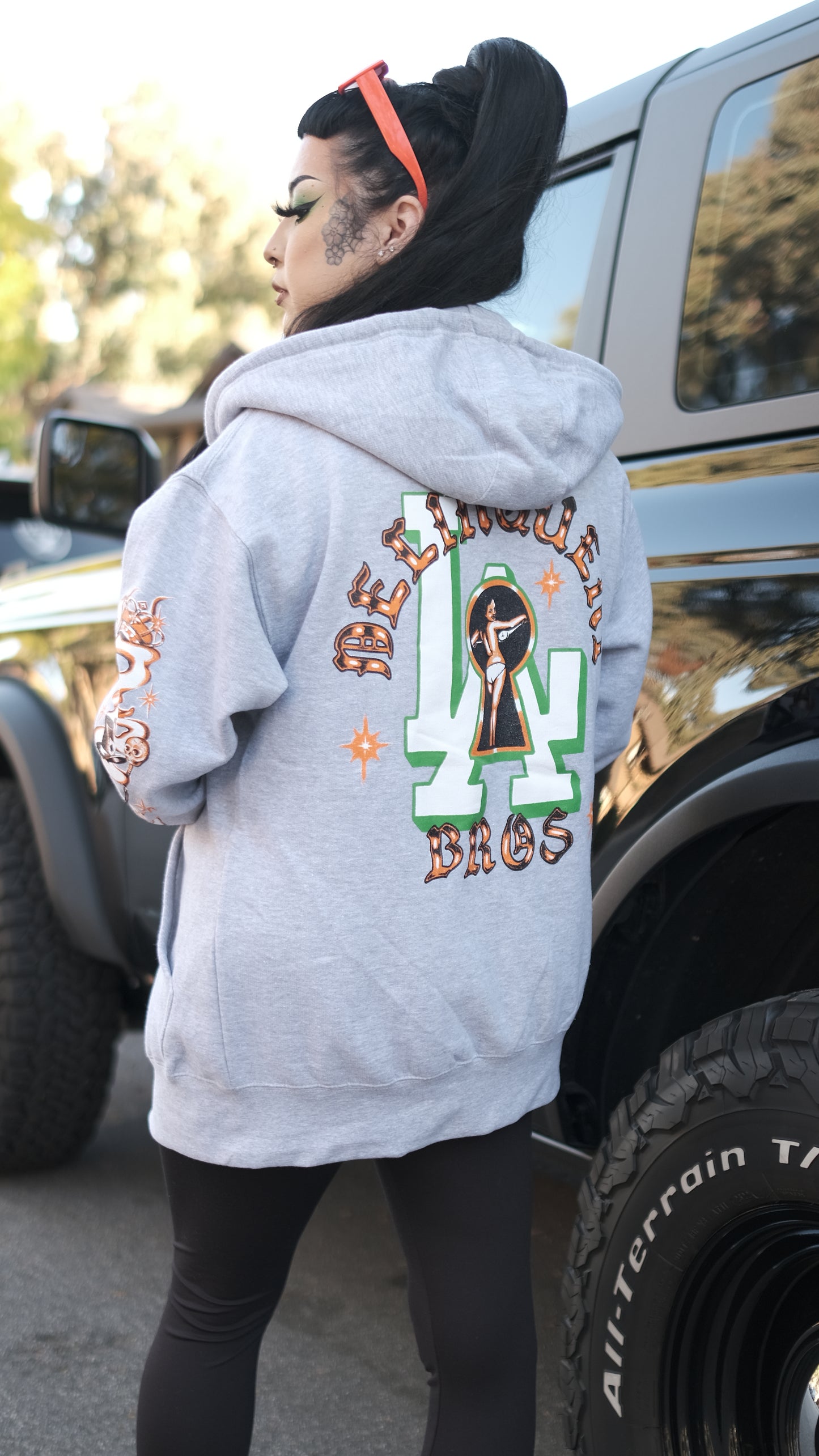 "Peek a Boo" Full Zip Hoodie in Gray.