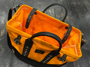 The Delinquent 40s style studded bag in Orange x Black